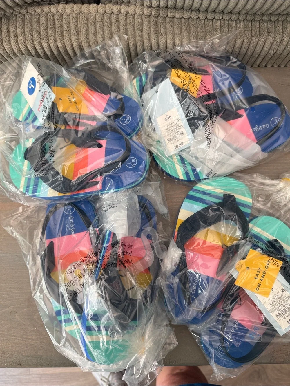 4 pair Cat & Jack Kids Striped Flip Flops in Navy, Pink, Teal, Yellow